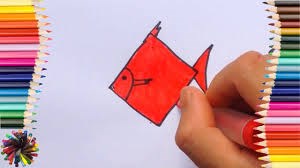 Bé tập vẽ và tô màu cá từ hình khối